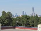Tall buildings can be seen from the Temple of Heaven, one of Beijing's most historic sites. 