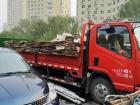 This truck will take cardboard to be recycled. Online package delivery is very popular in Beijing, which means a lot of leftover cardboard. 