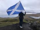 I held up the Scottish flag during one of the weekend trips for international students