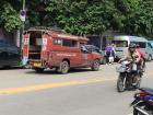 A sight of one of the infamous red trucks that I use on a regular for transportation