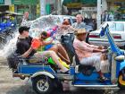 Water fights while in a tuk-tuk