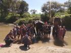 Group photo of everyone bathing elephants 