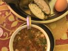 Bugis-style lunch: beef soup, an egg and steamed rice cakes