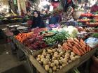 Vegetable seller in Kendari underground market 