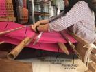 An explanation of the function of the different sticks within the loom