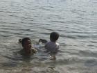 Fahri swimming at the beach five minutes from his house