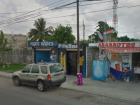 Here is a snapshot of my street with the local market where you can also get new garrafons (can you spot the video-game lounge?)