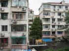 Shanghai is also home to apartments like these where entire families live in really small spaces