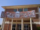 I work in this building! The sign was made by a Malawian artist.