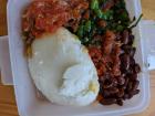 This is my typical lunch, with nsima, greens and beans