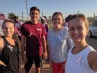 We’re wearing pink pins at the 5K race for breast cancer awareness
