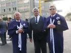 A group of brothers who are part of the 2500 brotherhood that carry the two-tonne paint work in the procession