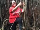 Climbing on a swing in the Amazon jungle