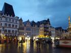 The city marketplace remains busy long after the sun has gone down