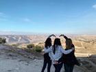 My friends and I making a heart at Umm Qais!