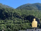 A photo taken from the top of Andorra’s government building, looking out on Andorra la Vella and at one of the Seven Poets of Andorra, each one representing a different parish 