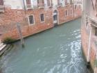 Door and stairs nearly underwater from rising tides