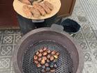 The sweet potatoes were grilling next to the chestnuts, and were selling for about 2 euros, which is just below 3 U.S. dollars