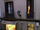 This is the view outside of my balcony at night. You can see both the fruit stand, and the restaurant below