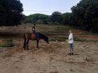 Me, helping my host brother train the younger horse!