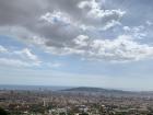 A broad view of the city from the mountains. It is quite compact, yet there are aspects of nature throughout