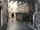 This street is in the medieval section of the city, and as you can see, it is narrow and the buildings are right on top of the pedestrians