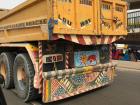 It is not just the buses and taxis that are decorated with religious imagery. The slogans on this truck show that the owner is a Mouride, one of the classifications of Muslim here in Senegal