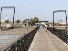 Bridge to the island of Joal-Fadiouth. I love this photo because of the visible architectural evidence of religious diversity