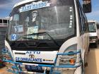 An example of the blue and white TATA bus. Notice the religious imagery on the windshield