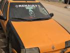 A typical taxi: Notice the religious imagery on the windshield