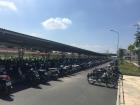This photo shows the parking lot of my school on an average day. Motorbikes are the main method of transportation for students. No youth owns a car.