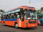 Busses in Vietnam are basically the same as busses in America. The primary difference is how many people ride at one time. Riders almost always exceed the number of seats available and people are frequently forced to sit on the ground. 