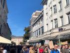 This was a student protest related to protecting the environment--a huge line of people, all walking through the streets and carrying creative signs and posters