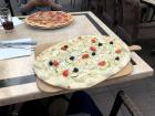 Flammkuchen (with a pizza in the background)