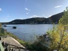 A riverside view from a restaurant porch