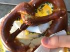 Classic Bavarian snack—pretzel with butter and chives 