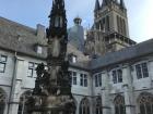 A fountain and the town hall in Cologne