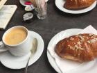 Croissants and cappuccinos at a cafe