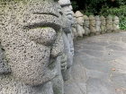 Stone statues found near Cheonjiyeon Waterfall.