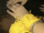 In the ceremony, your wrist is tied with a piece of yarn like this