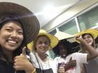 Two of my classmates visited my homestay house and our mothers gave us all hats