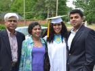 My dad, mom, brother and I at my high school graduation (2013)