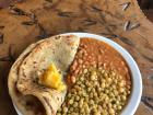 Another Rwandan meal-- the portions are large here! Here we have beans, peas and a small bit of maize (a creamy substance from corn) with chapati