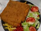 Each cachopo looks a little bit different. This one is a square and is served with fries and a salad