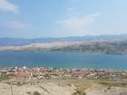 Here you can see the mainland in the background; this picture is taken from Pag and in the foreground, you can see one of the small towns on the island