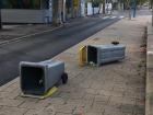 Spilt trash cans near the tram stop