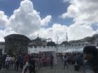 A plaza with vendors selling street food