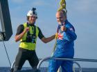Richard (in blue) just before diving nearly seven miles beneath the Pacific Ocean to the bottom of the Marianas Trench
