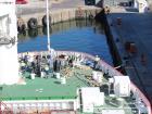 Deck crew casting off from the quayside in Cape Town, South Africa