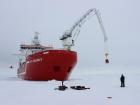 The S.A. Agulhas II lowering equipment and people onto the ice